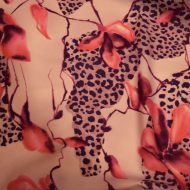 Coral and tan leopard orchid