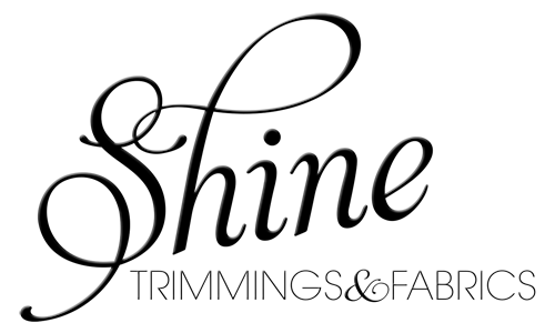 Shine Trimmings brand Fabrics logo