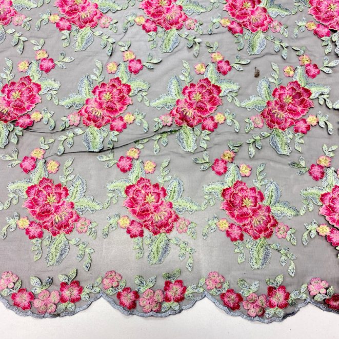 Black mesh with multi coloured flowers shine trimmings fabrics
